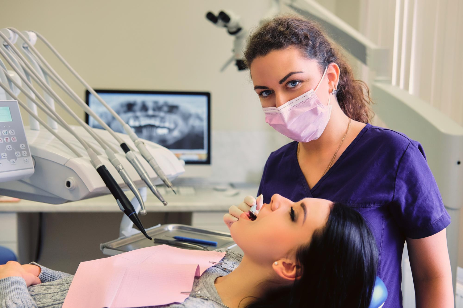 close-up-image-dentist-examining-female-s-teeth-dentistry